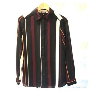 Sheer long sleeve striped blouse.